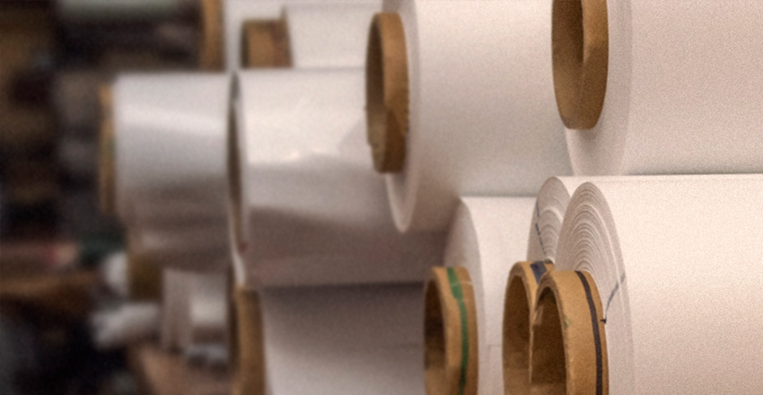 rolls of white material on cardboard tubes